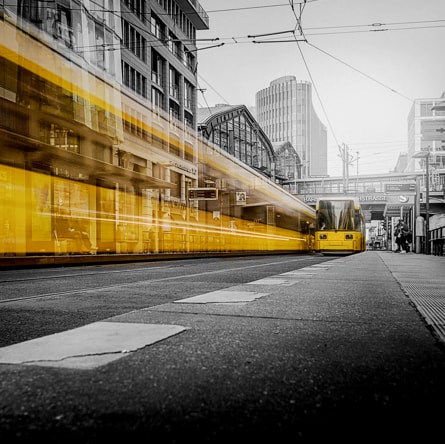 a bus passing by on a busy street